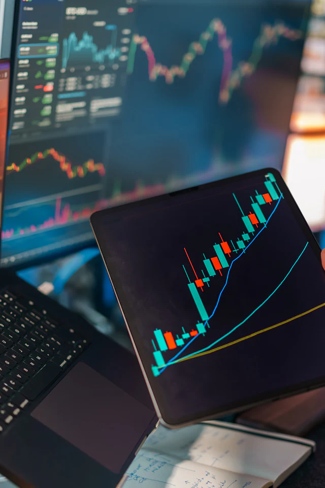 Market analytics and execution charts across multiple screens